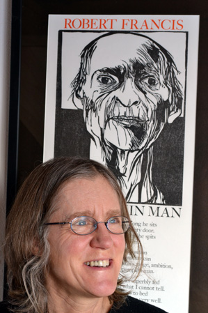 Ays with a poster from Bill